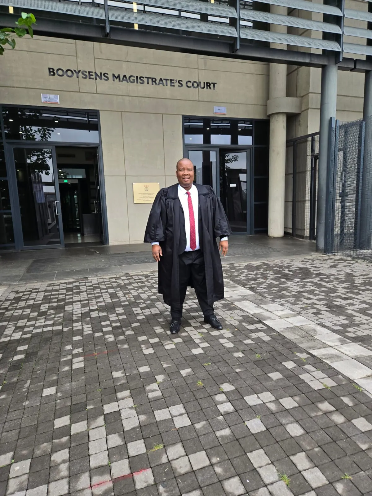 Washington Magampa in court robes outside Bootsens Magistrate's Court